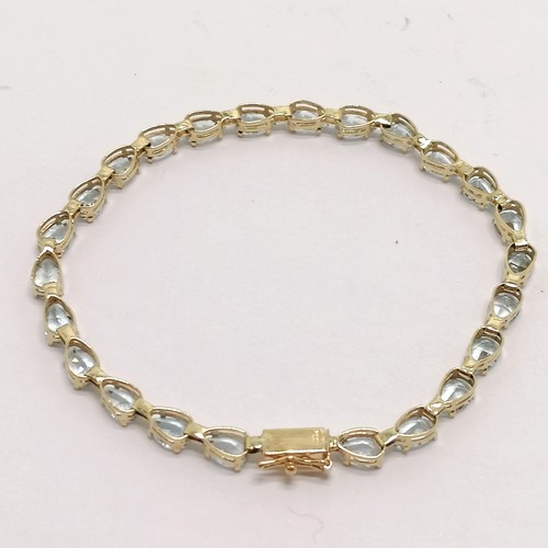 290 - 10ct hallmarked gold pear shaped aquamarine bracelet - 18cm long 5.1g total weight