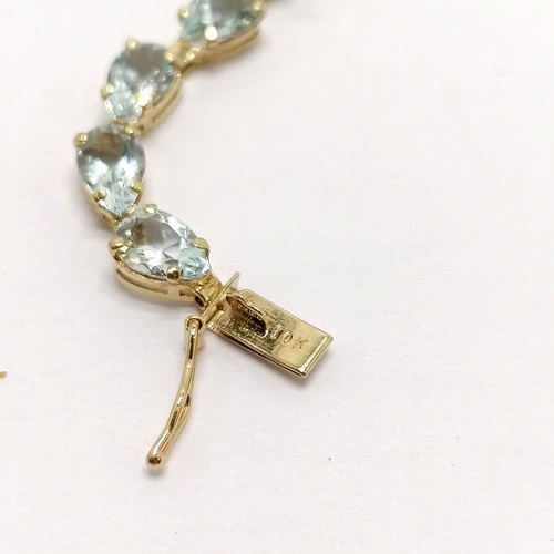 290 - 10ct hallmarked gold pear shaped aquamarine bracelet - 18cm long 5.1g total weight