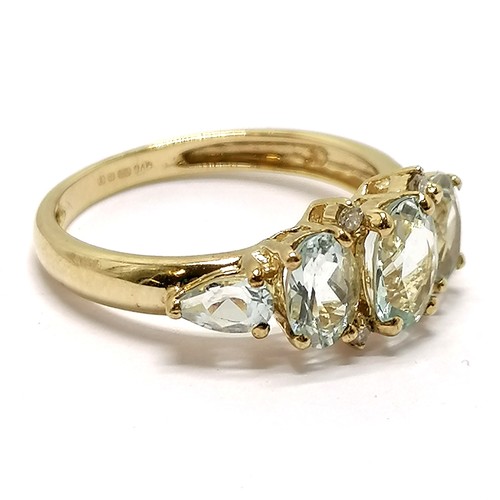 291 - 9ct hallmarked gold aquamarine & diamond ring - size N½ & 2.3g total weight