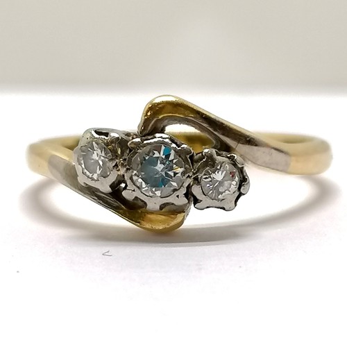 308 - Unmarked gold (touch tests as 18ct) 3 stone diamond ring - size P½ & 3.4g total weight