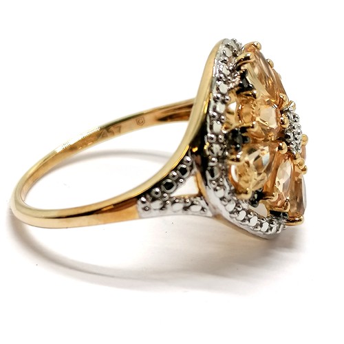 323 - 9ct hallmarked gold topaz & diamond cluster ring - size Q & 2.9g total weight