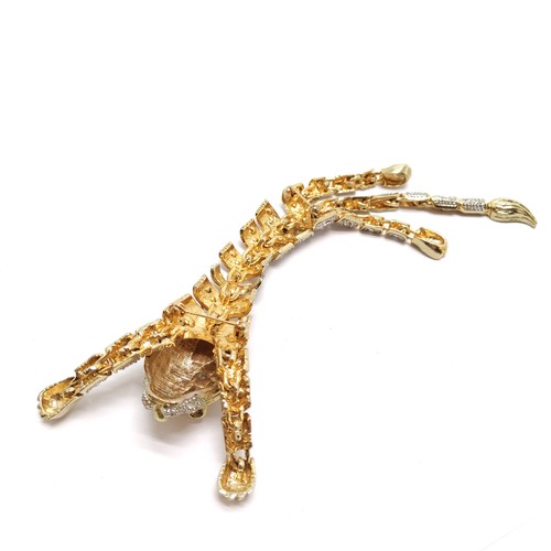 339 - Large costume jewellery articulated lion brooch - 20cm total length with 2 pin attachments