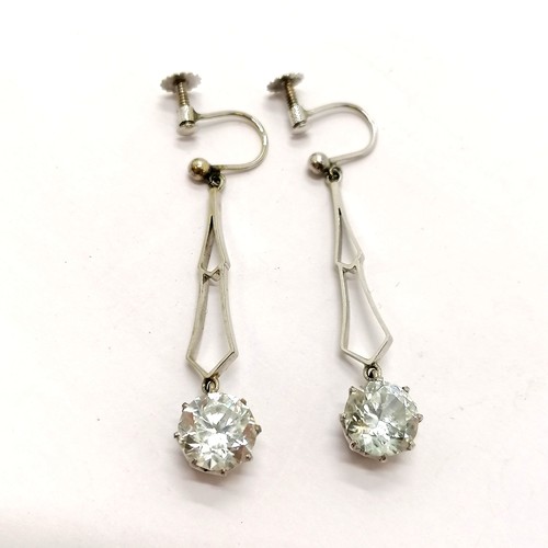 411 - Pair of 9ct marked white gold Art Deco screw back earrings set with white topaz - 4cm drop & 4g tota... 