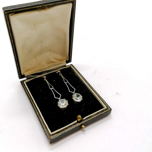 411 - Pair of 9ct marked white gold Art Deco screw back earrings set with white topaz - 4cm drop & 4g tota... 