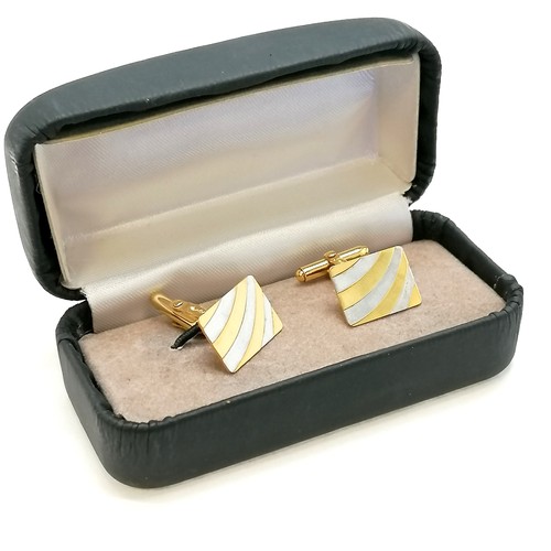 414 - Pair of 9ct import marked gold (white / yellow) cufflinks by Andreas Daub - 4g