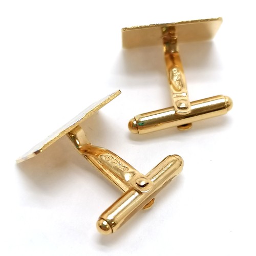 414 - Pair of 9ct import marked gold (white / yellow) cufflinks by Andreas Daub - 4g