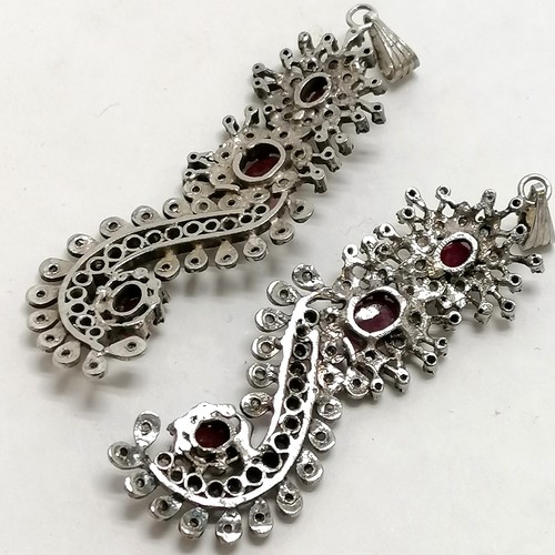 428 - Pair of white metal mounted diamond & red stone pendant / earrings - total length inc bale 7.5cm