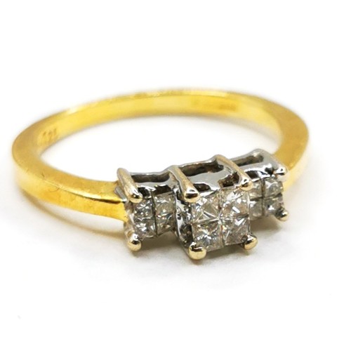 440 - 18ct hallmarked gold diamond ring set with 12 princess cut diamonds - size M & 3.1g total weight