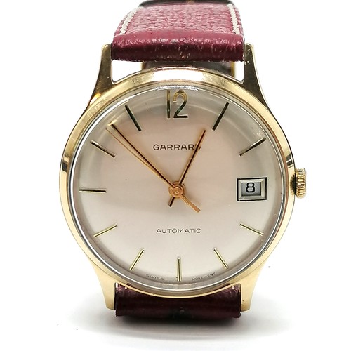 463 - 9ct gold cased Garrards of London automatic watch with date aperture (32mm case) in original retail ... 