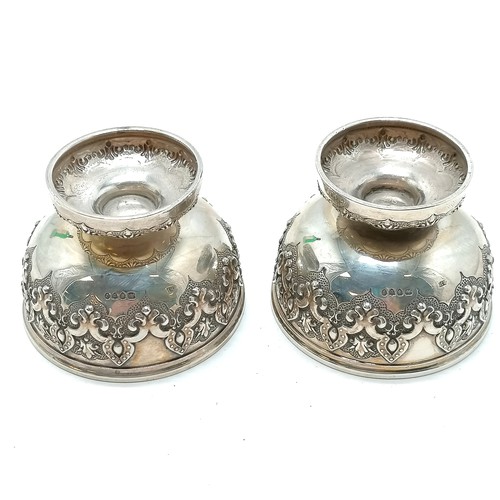 491 - Victorian pair of heavy cast sterling silver salts - 6cm diameter & 4.5cm high & 110g