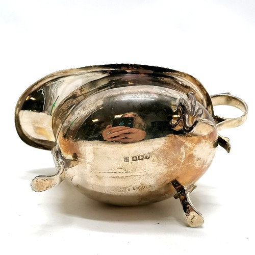 498 - Sterling silver sauceboat with gadrooned edge & terminating on 3 paw feet by Cooper Brothers & Sons ... 