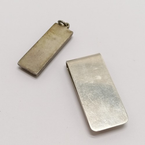 517 - Silver ingot pendant t/w 2000 silver money clip - 49g