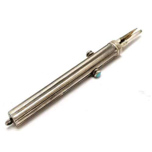 579 - Unmarked antique silver combination propelling pen / pencil with turquoise stone set button - length... 