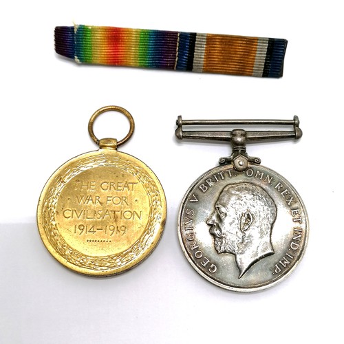 587 - Royal Navy WWI pair of medals (Victory & British War Medal) awarded to K.34620 A J Lone Sto.1 R.N. +... 