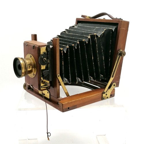 6 - Antique mahogany & brass mounted bellows camera by B.C.C. (Boots Cash Chemist) with 3 developing pla... 