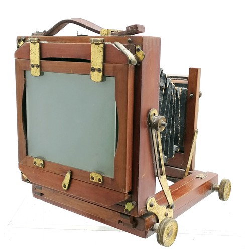 6 - Antique mahogany & brass mounted bellows camera by B.C.C. (Boots Cash Chemist) with 3 developing pla... 