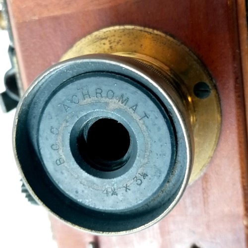 6 - Antique mahogany & brass mounted bellows camera by B.C.C. (Boots Cash Chemist) with 3 developing pla... 