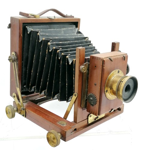 6 - Antique mahogany & brass mounted bellows camera by B.C.C. (Boots Cash Chemist) with 3 developing pla... 