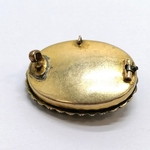 113 - Antique yellow metal brooch with pearl & dark blue / white enamel - 2.6cm across & lacks pin & scuff... 