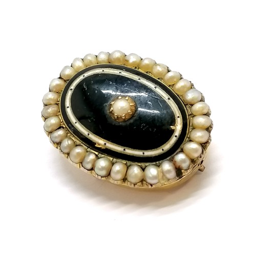 113 - Antique yellow metal brooch with pearl & dark blue / white enamel - 2.6cm across & lacks pin & scuff... 