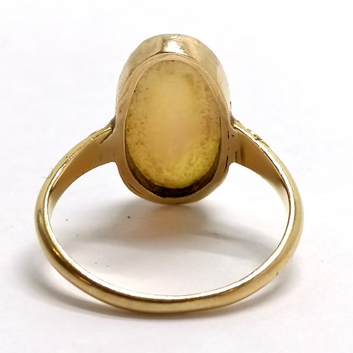 121 - 18ct hallmarked gold opal ring - size Q & 3.6g total weight ~ slight marks to stone