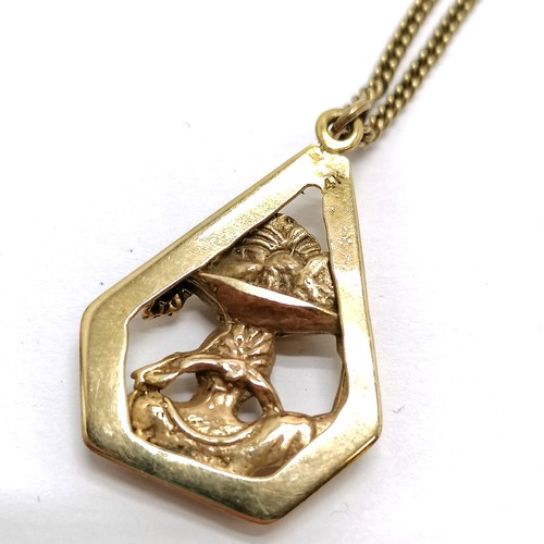 136 - Unmarked gold ethnic pendant on 9ct marked gold 62cm chain - 13.2g - SOLD ON BEHALF OF THE NEW BREAS... 