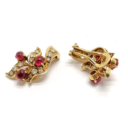 147 - Pair of unmarked 18ct gold clip-on earrings set with cabochon rubies & diamonds - 2.5cm drop & 9g to... 