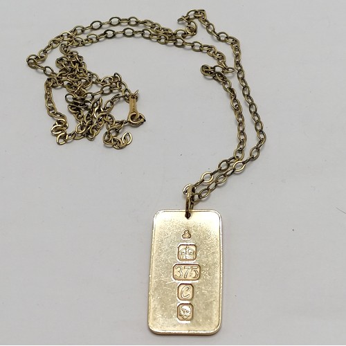 179 - 9ct hallmarked gold ingot on a 9ct marked gold heavy gauge belcher link 68cm chain - 78.5g