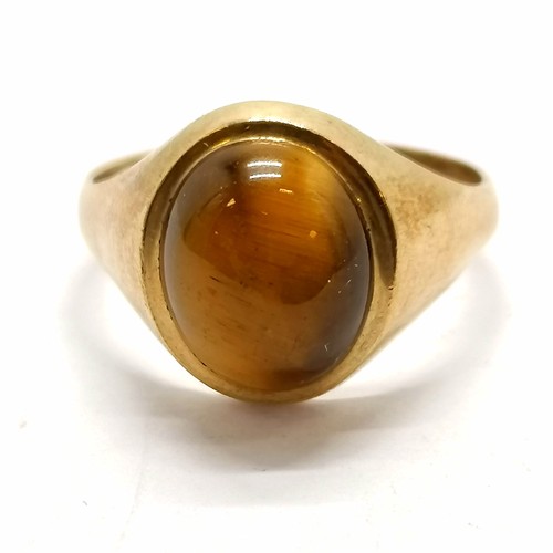 183 - 9ct hallmarked gold cabochon tigers eye stone set ring - size V & 3.9g total weight