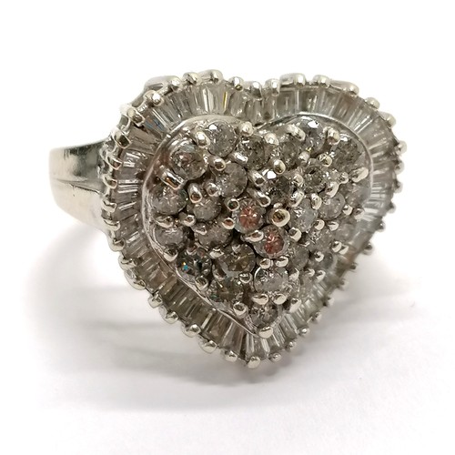 202 - 18ct white gold marked heart design diamond (baguette + brilliant cut) set cluster ring - size M½ & ... 