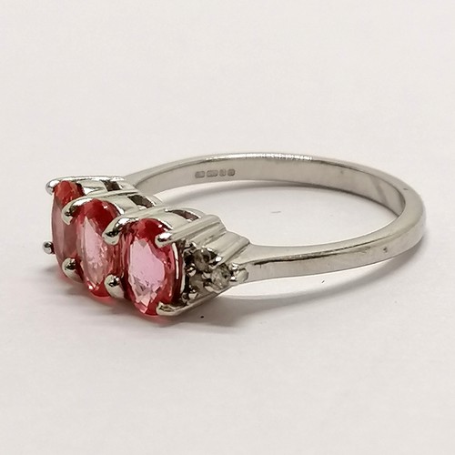 207 - 18ct hallmarked white gold pink sapphire & diamond ring - size N½ & 3.8g total weight