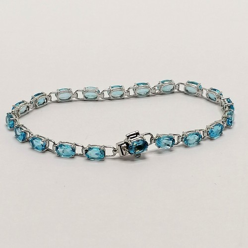 208 - 18ct marked white gold blue topaz stone set bracelet - 17cm & 7.7g total weight