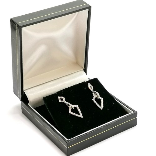 210 - Pair of 18ct hallmarked white gold diamond set earrings - 2.2cm drop & 2.2g total weight