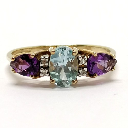 211 - 9ct hallmarked gold blue topaz, amethyst & diamond set ring - size R & 2.2g total weight