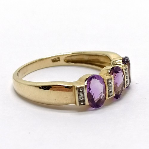 212 - 9ct marked gold amethyst & diamond stone set ring - size P & 2.6g total weight