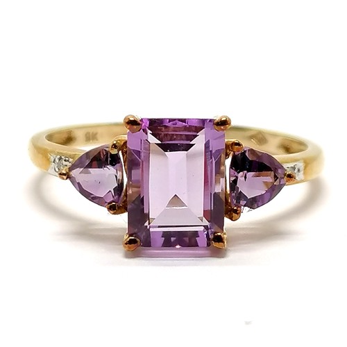 213 - 9ct marked gold amethyst (rectangular + 2 trillion cut) ring with diamond set shoulders - size P½ & ... 