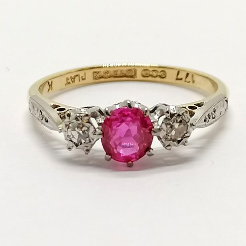 223 - 18ct hallmarked gold & platinum ruby & diamond 3 stone ring - size O & 2.7g total weight