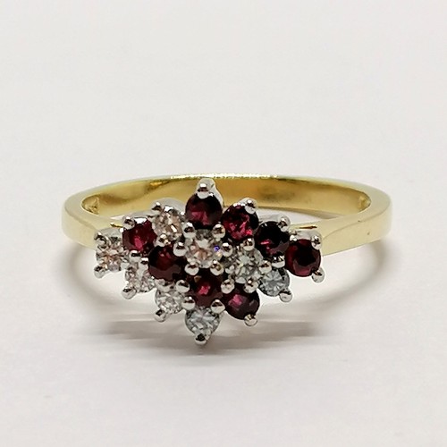 224 - 18ct hallmarked gold ruby & diamond set cluster ring - size N & 3.6g total weight