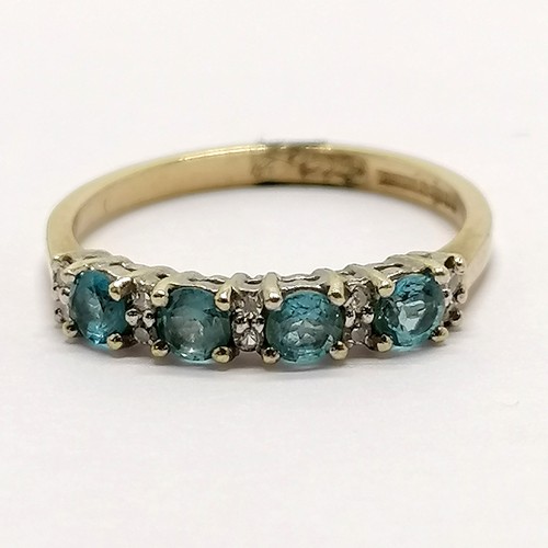 226 - 9ct hallmarked gold blue topaz & diamond set ring - size N½ & 1.8g total weight