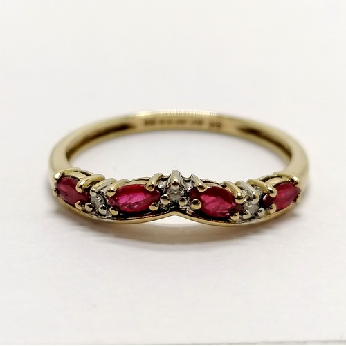 228 - 9ct hallmarked gold ruby & diamond wishbone shaped ring - size P & 1.5g total weight ~ note 1 side o... 