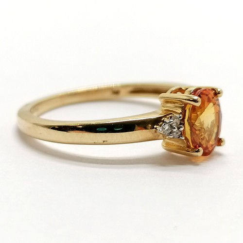 229 - 9ct hallmarked gold orange topaz & diamond set ring - size O½ & 2.3g total weight