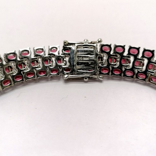 240 - Silver tourmaline (?) 3 row stone set bracelet - 19cm & 32g total weight