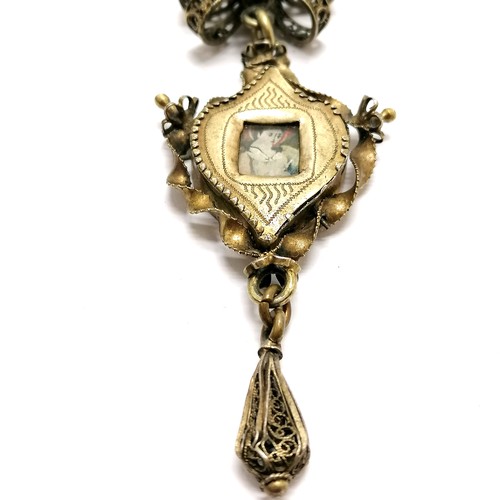 247 - Antique Swiss unmarked silver gilt religious Deli pendant with reverse glass paintings to both sides... 