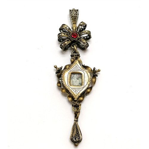 247 - Antique Swiss unmarked silver gilt religious Deli pendant with reverse glass paintings to both sides... 