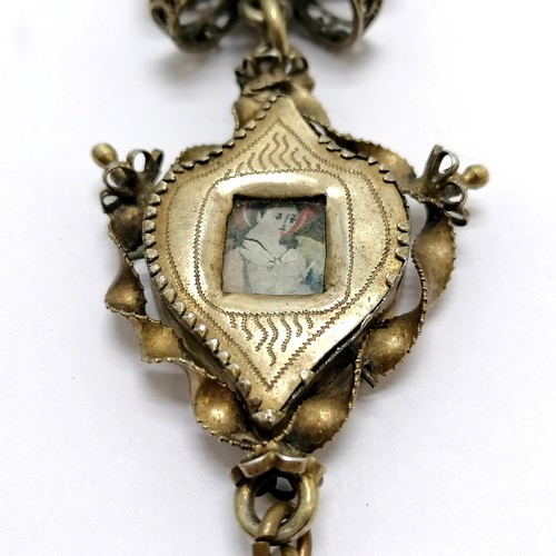 247 - Antique Swiss unmarked silver gilt religious Deli pendant with reverse glass paintings to both sides... 