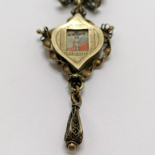 247 - Antique Swiss unmarked silver gilt religious Deli pendant with reverse glass paintings to both sides... 