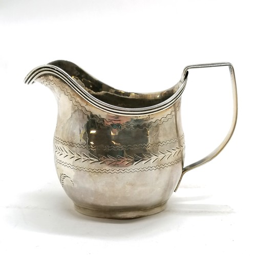 295 - Antique silver cream jug, hallmarked London 1783. 122g. 7cm high. Has dents around the base and old ... 