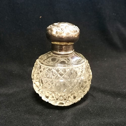 296 - Hobnail cut perfume bottle with Chester hallmarked lid. 8cm high. slight dent to lid and small nicks... 