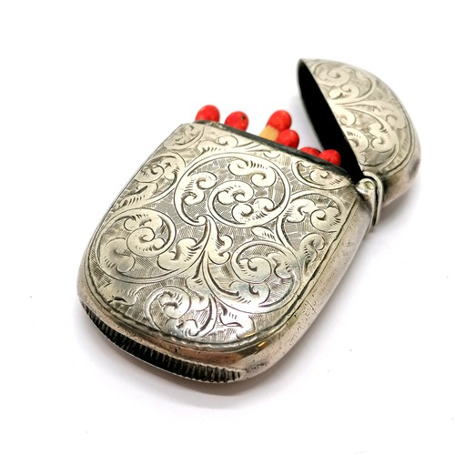 297 - Antique silver vesta case with hand chased decoration - 4.5cm long & 20g total weight (not including... 