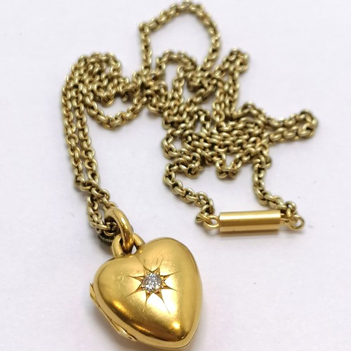 452 - Antique 15ct hallmarked gold heart pendant set with a diamond by John William Kirwan on an unmarked ... 